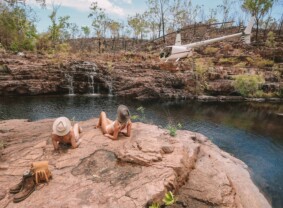 Girls relaxing at Sandy Creek. Image credit: Tourism NT/Lucy Ewing