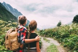 Hikers walking to mountains