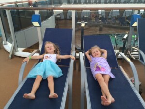 Family cruising- Carnival Legend relaxing on deck